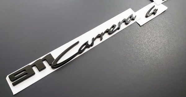 Black 911 Carrera S emblem nameplate badge