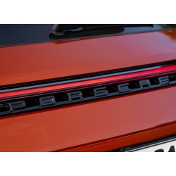 Black PORSCHE letters emblem